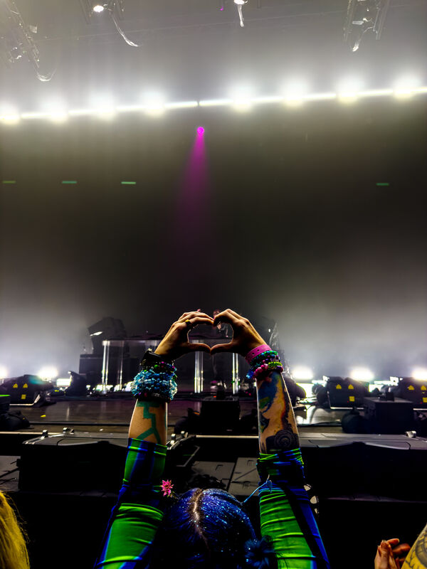 She Makes Heart Hands