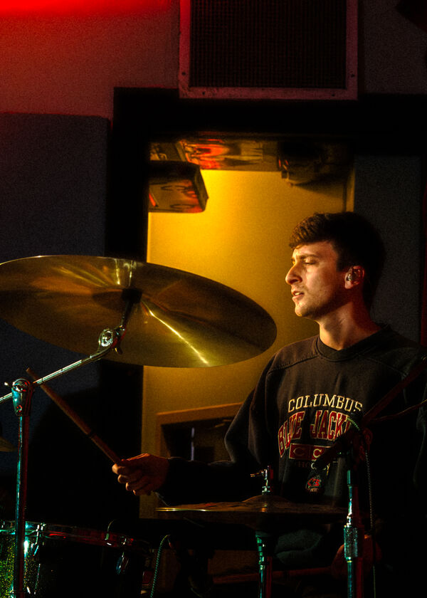The Drummer, the Yellow Wall